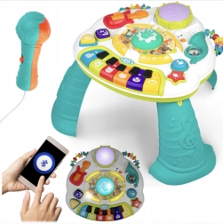 Educational music table with piano, trumpet and microphone