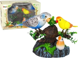 Пеещи подвижни папагали на цветно дръвче