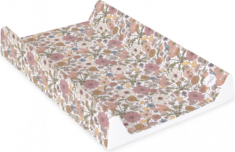 Raised edges for safer changing