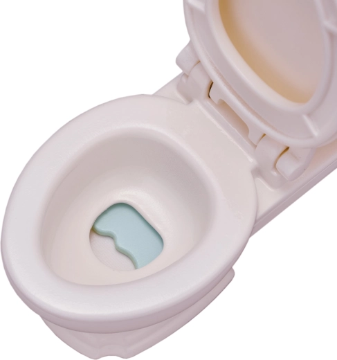 Toilet with a lift-up seat for realistic play