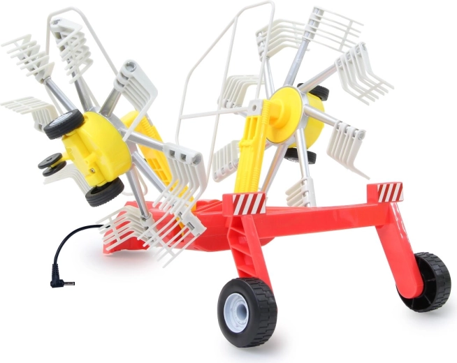Rotating tines while driving