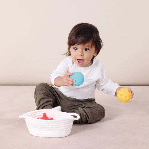 Sensory balls and basket for tactile exploration