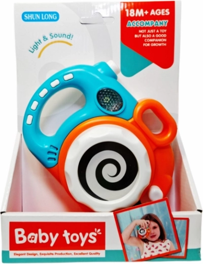 Interactive kids' camera with lights and sounds