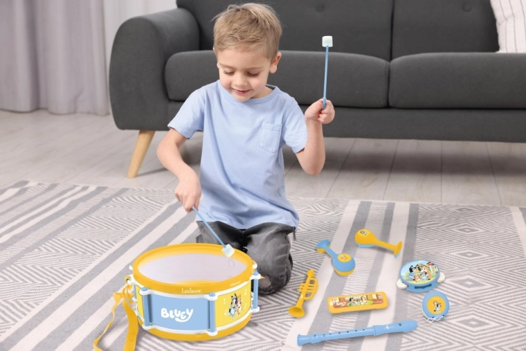 Drum with strap and drumsticks