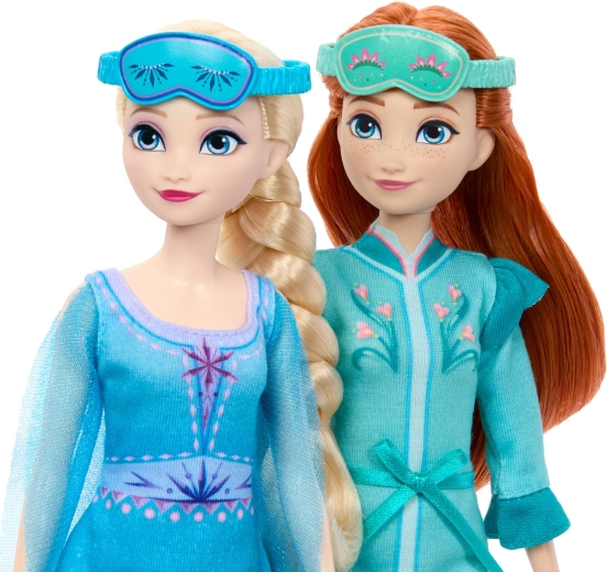 Anna and Elsa dolls in night outfits