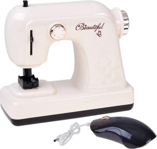 Children's sewing machine with sounds and light