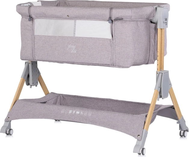 Bedside crib with drop-down side