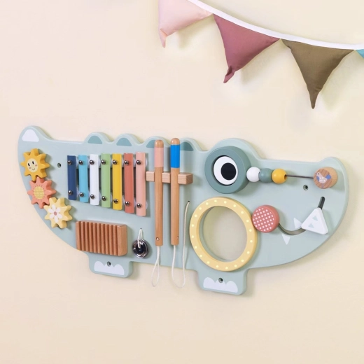 Wall-mounted board saves space and invites discovery