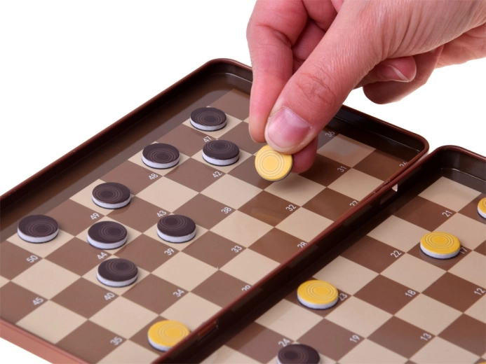 Magnetic pieces for playing while traveling