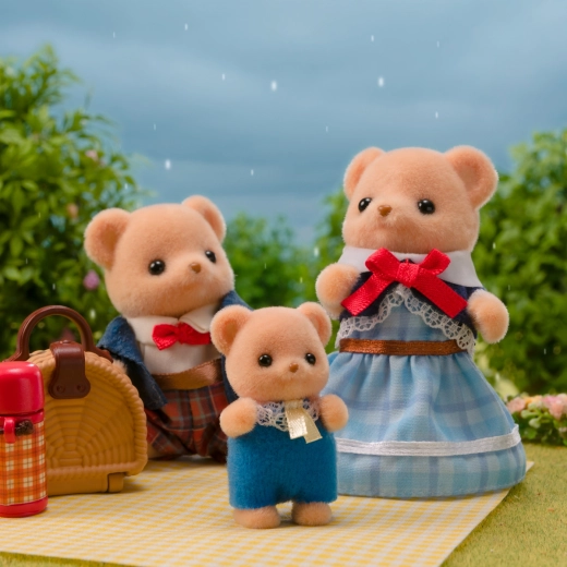 Three cute figures with a soft velvety flock