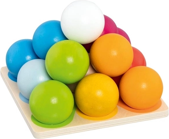 Wooden construction pyramid of colorful marbles