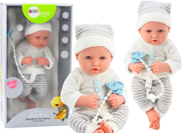 Lifelike baby doll in white-gray outfit with cap and pacifier