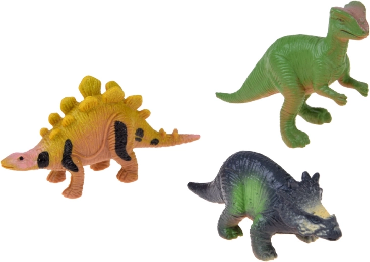 3 dinosaur figurines and glow-in-the-dark stickers