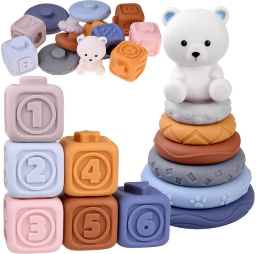Soft rubber sensory blocks and a stacking pyramid with a teddy bear