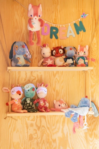 A soft cuddle buddy and a practical crib toy