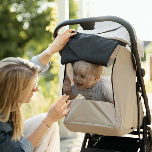 Comfort from birth: lie-flat recline and UPF 50+ canopy