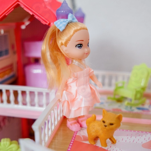 A doll and a kitten for play full of stories