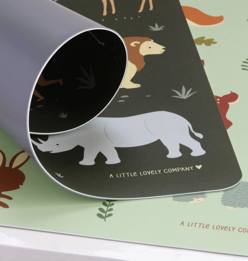 A Little Lovely Company placemat with savanna animals