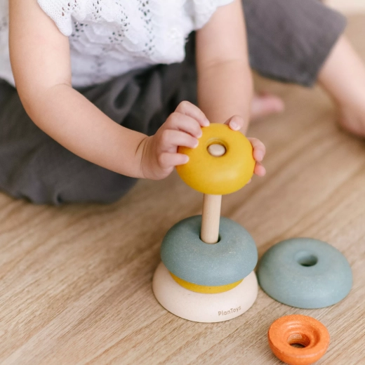 Stacking and threading to develop motor skills
