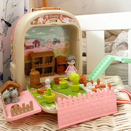 A farm with a garden and animals