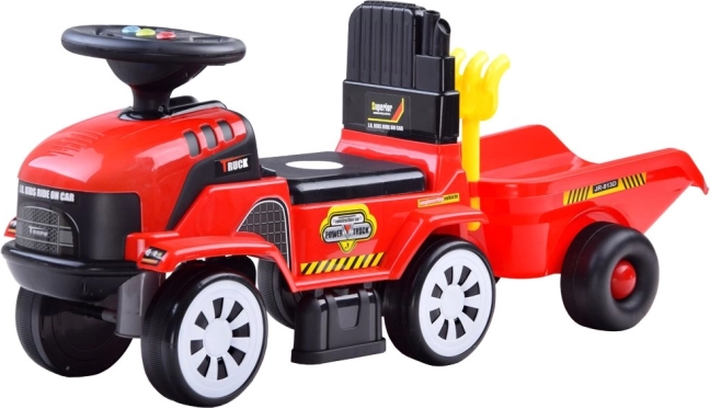 Ride-on tractor with trailer and melodies for children – Red