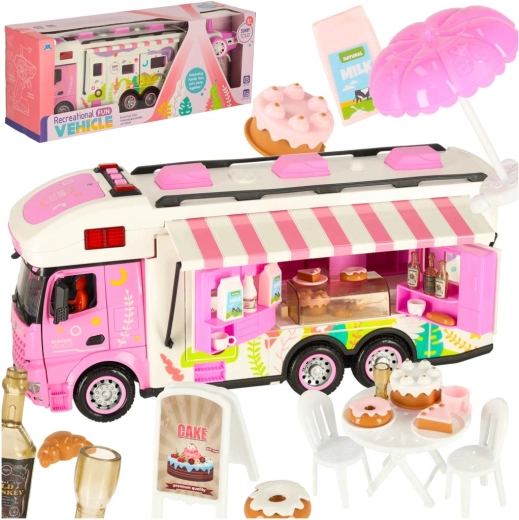 Pink remote-controlled camper van with accessories