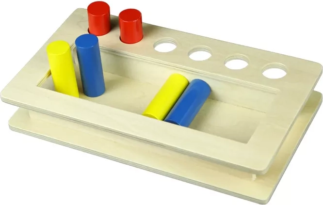 Wooden peg inserter with cylinders for holes