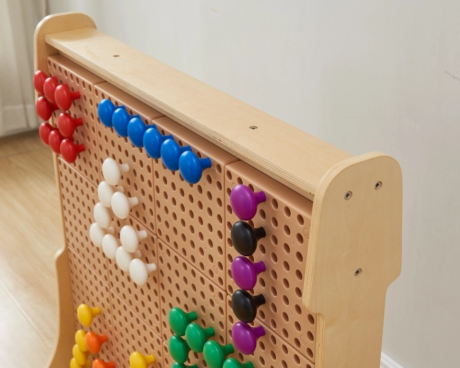 Large wooden perforated panel for fine motor skills