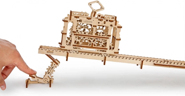 Wind-up mechanism for uphill and return travel
