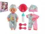 Baby doll with solid body and accessories, 25 cm